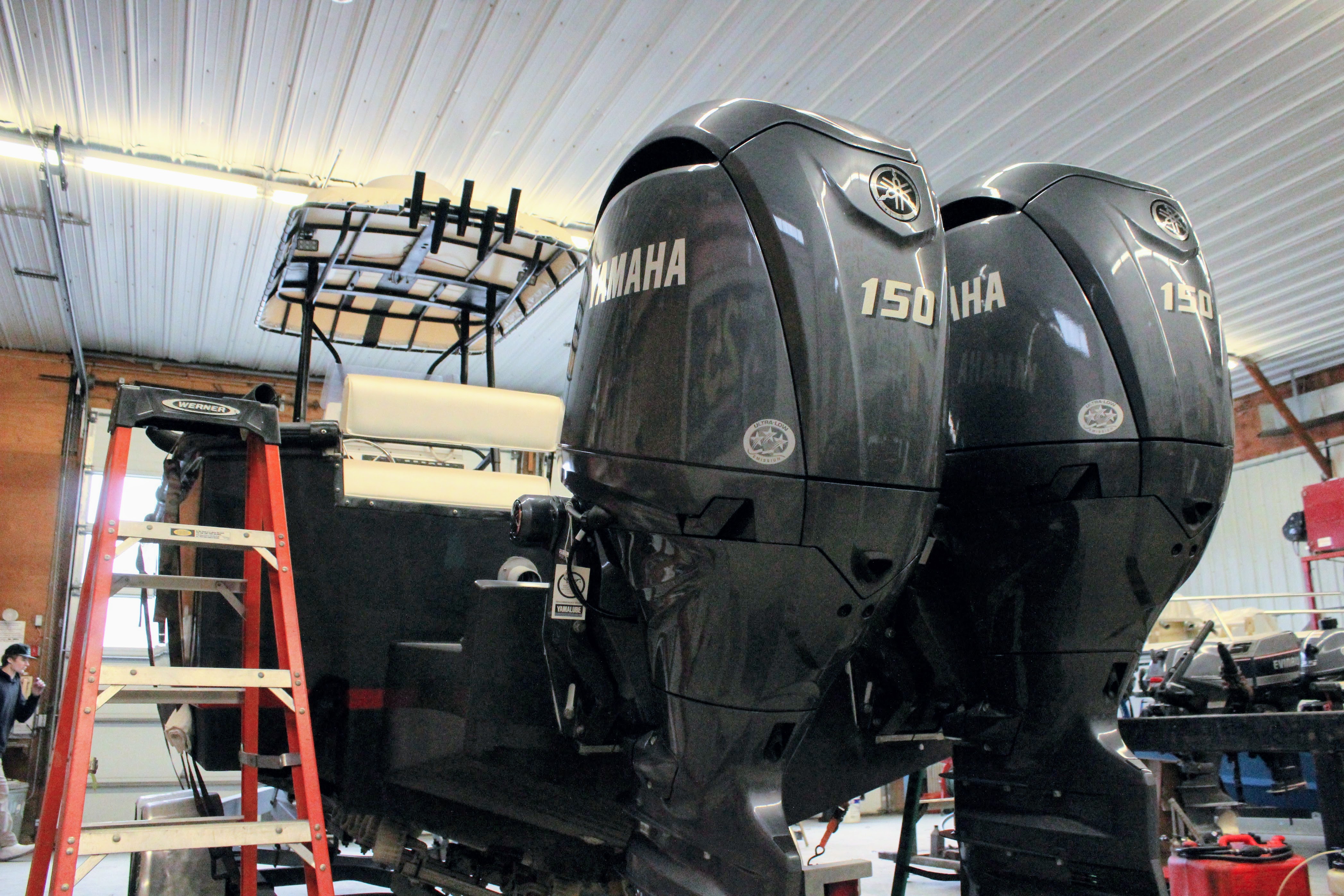 Taylor Point Boat Yard team working on a boat repower project
