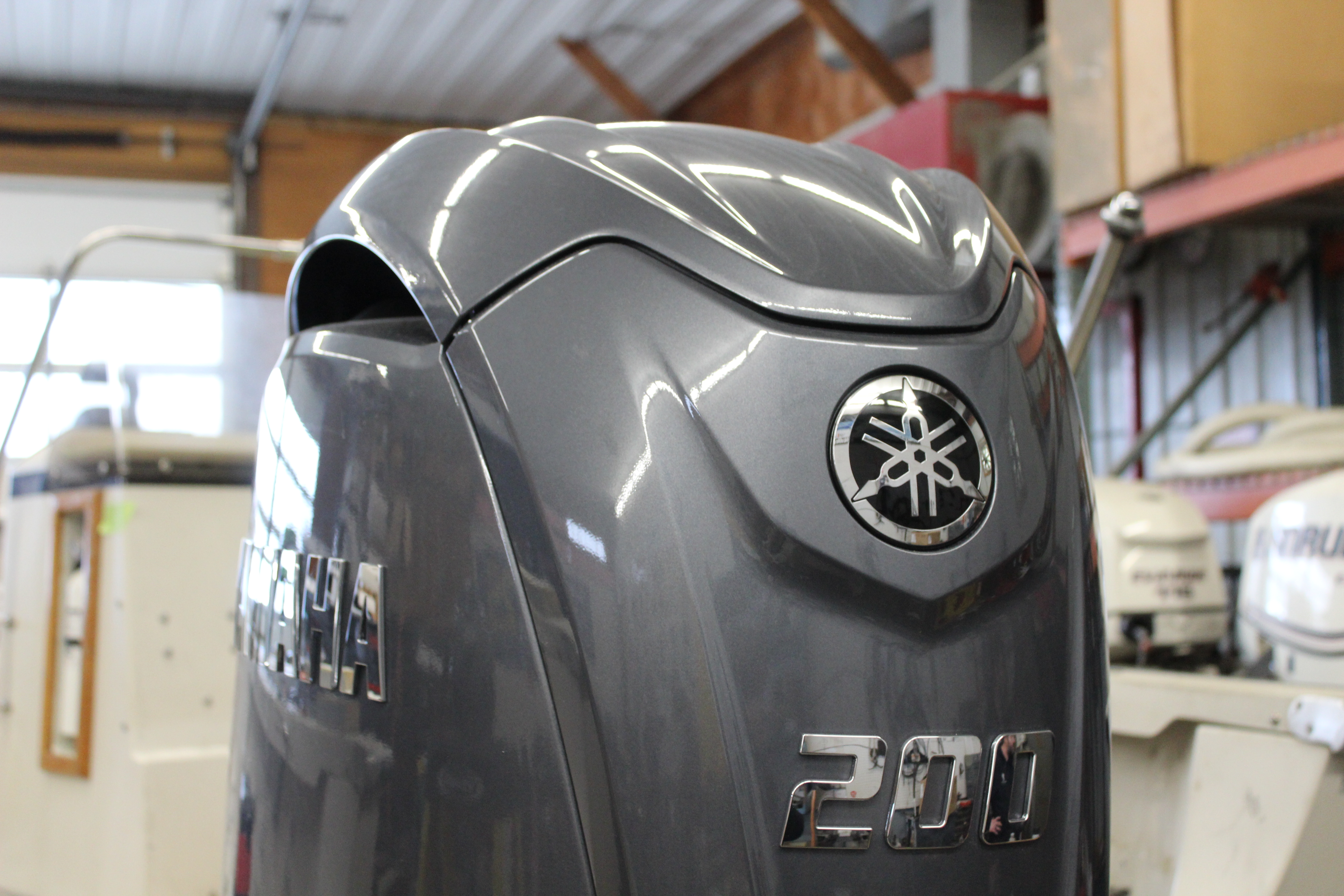 Modern Yamaha outboard installed on a repower project